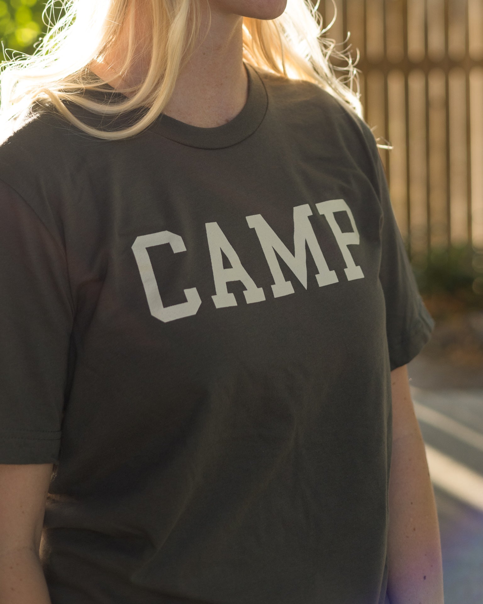 Person wearing the Camp T-Shirt showing its relaxed fit and classic outdoor-inspired design.
