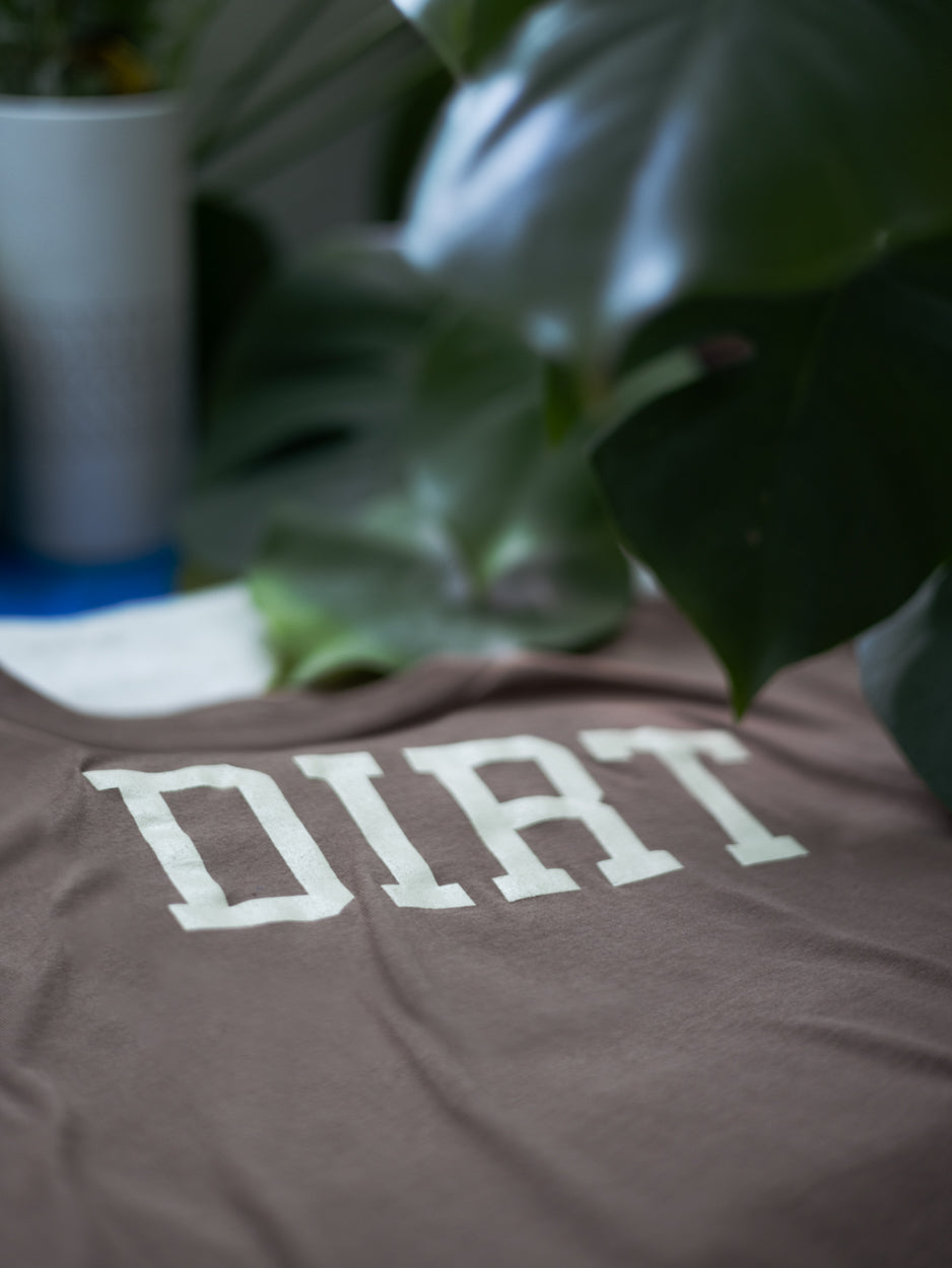 Close-up of The Dirt T fabric, perfect for gardening, hiking, or getting dirty.